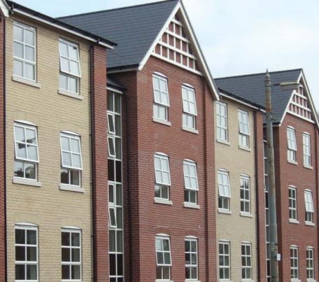 row of houses with aluminium windows